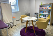 Library wellbeing zone design — families using a health and wellbeing space in a public library