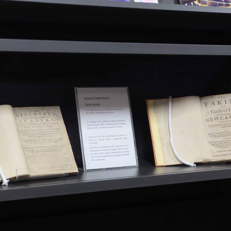 Museum box displaying early books from special collections
