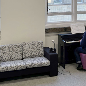 Sofa with power and acoustic piano