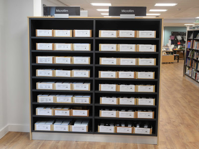 Microfilm storage shelves with neatly organised boxes at Gateshead Archive
