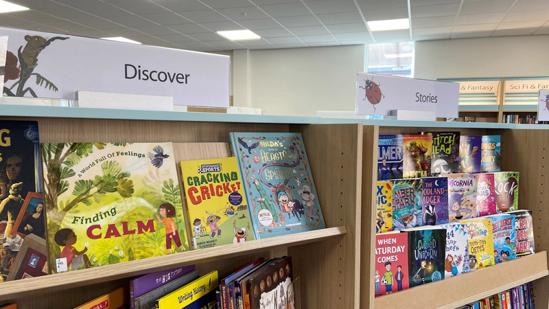 Face-out book displays featuring colourful children's titles in the stories and discover sections at Blaydon Library