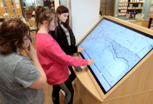 Digital library design — technology integration with screens and computers in a public library space