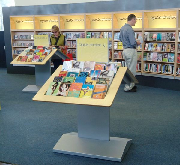 Two face-out book displays featuring a curated selection of titles in a browsing area at Allerton Library
