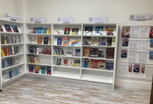 Library workspace design — co-working seating area in a public library business support zone