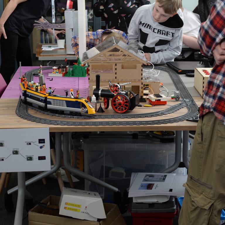 Children's MakerPlace tables with Lego electric train