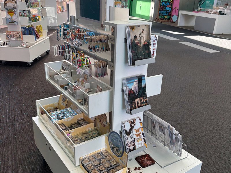 The bottom section can be open deep display pockets or closed storage