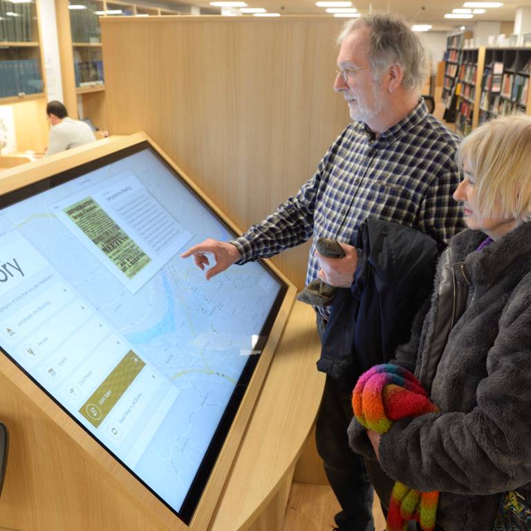 A couple using interactive smart screen