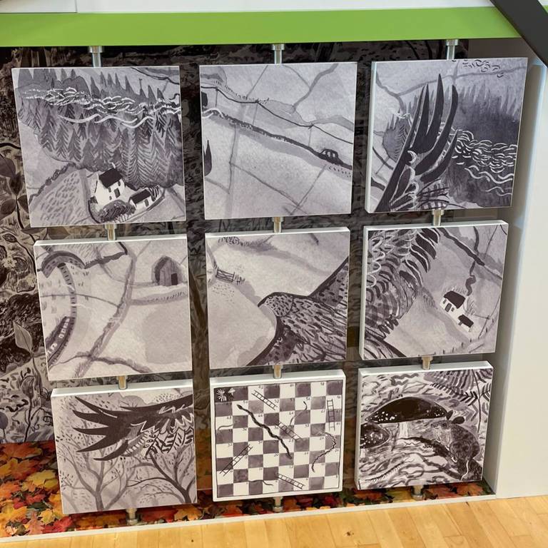 Graphic panels include magnetic adders and ladders game
