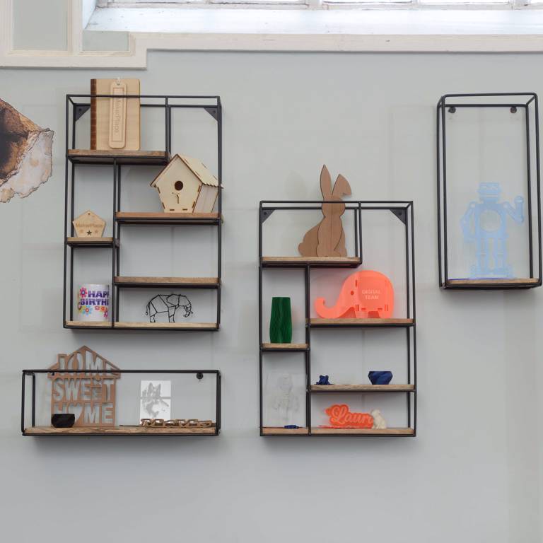 Display shelves with items produced in MakerPlace