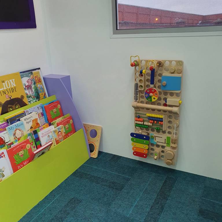 Story Bus puzzle and bookshelves