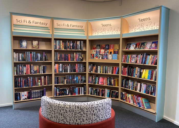 Teen library zone design — young people's library space with defined seating area