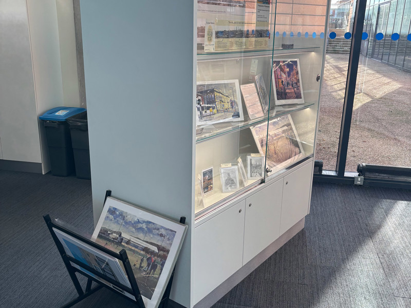 Valuable prints in cabinet and browsable ones in flipper stand