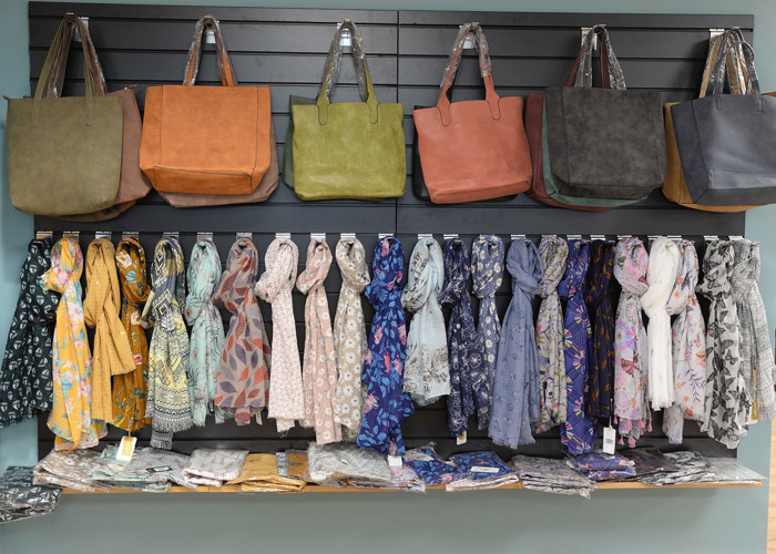 Library shop design — mobile retail merchandising unit with books and gifts for sale