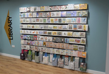 Library shop design — mobile retail merchandising unit with books and gifts for sale