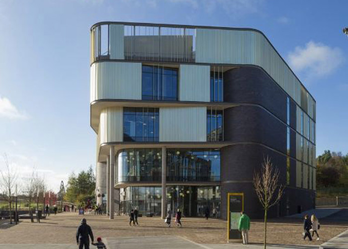 New build public library exterior — modern glass facade library interior design project