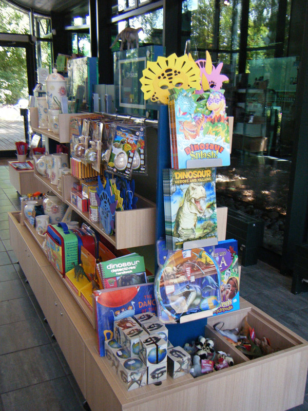 Colourful themed book displays and merchandise in a retail unit at Woodstock Museum Shop – units customised for specific products