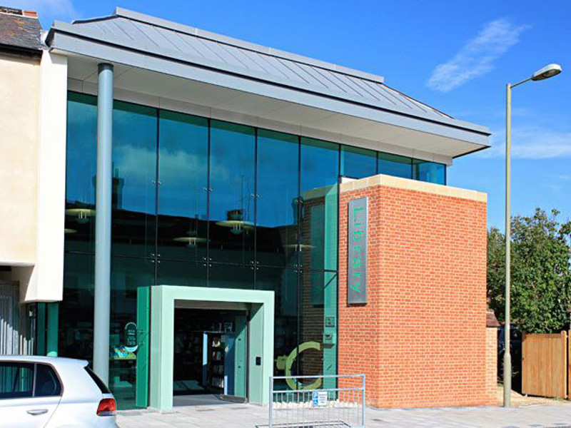 Modern glass façade and distinctive brick entrance at Thame Library