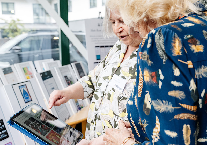Her Majesty tries a book cover interactive