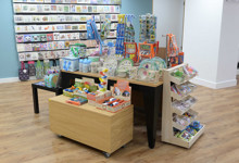 Library shop design — mobile retail merchandising unit with books and gifts for sale