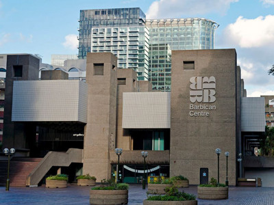 Brutalist architecture of the Barbican Centre with textured concrete and geometric shapes at Barbican Library