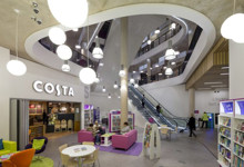 New build public library exterior — modern glass facade library interior design project