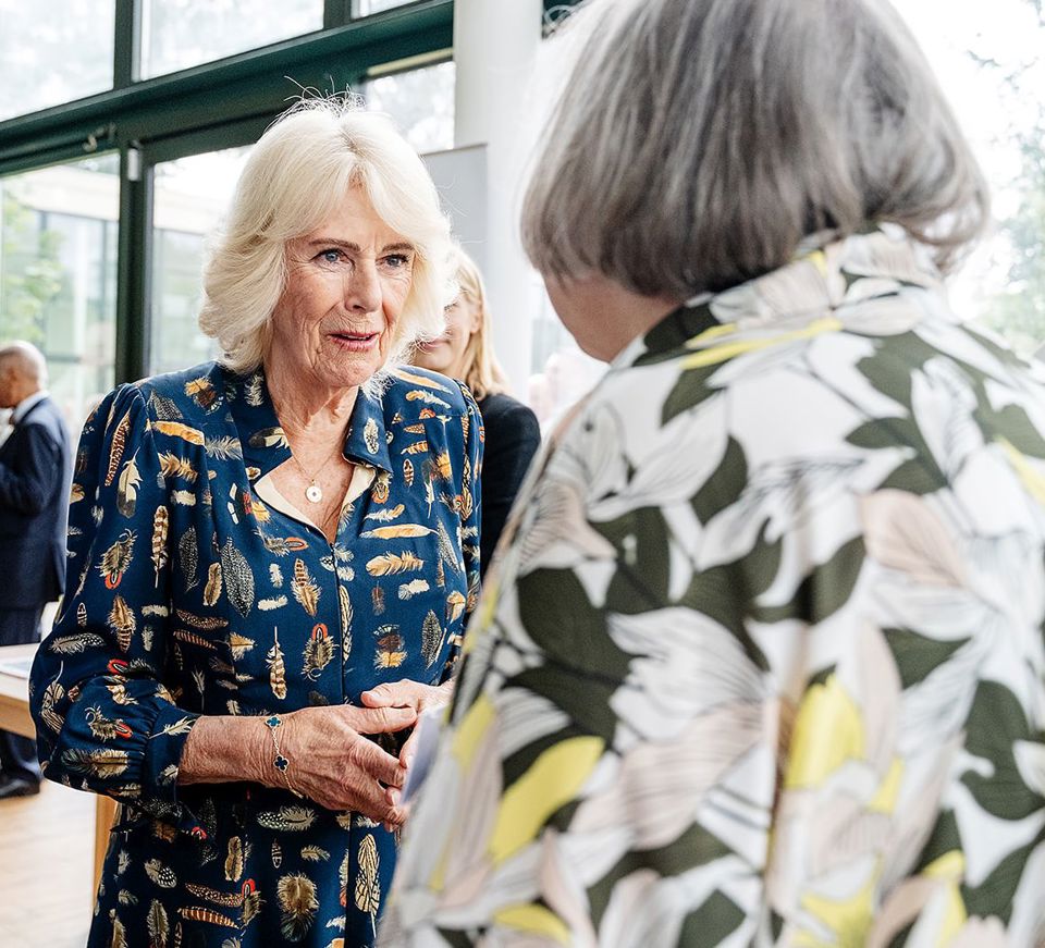 Rachel Van Riel meeting Her Majesty Queen Camilla.