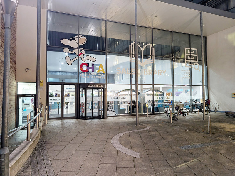 Exterior signage at dusk