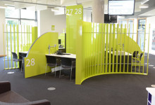 Council contact and advice library design — customer service zone with advice desks and waiting area at Southwater Library